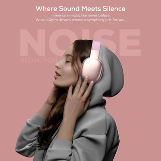 A person wearing a gray hoodie and pink headphones is shown against a pink background. The text reads, "Where Sound Meets Silence. Immerse in music like never before with Gabba Goods' 'Vibe' Noise Reduction Wireless Headphones featuring Bluetooth Connectivity. 40mm drivers create a symphony just for you. NOISE REDUCTION TECHNOLOGY.