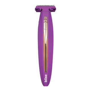 A product from the brand "bliss," the 2in1 Body Shaver & Trimmer, is a purple electric hair trimmer with a sleek design and bi-directional shaving mechanism. It features a rose gold-colored power button and highlights along the body. The device is ergonomically shaped for comfortable handling, ensuring a flawless shave every time.