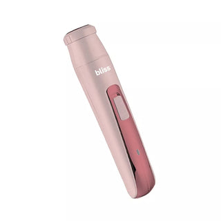 A pink and silver handheld grooming device, named the Portable Body Shaver & Precision Trimmer by bliss. The slim, cylindrical body features a switch button for operation and is designed for personal care use. Dermatologist-approved, the device boasts a sleek, modern design and is angled slightly in the image.