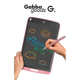 An imaginative scene displayed on an 8.5" Multicolor LCD Drawing & Doodling Pad features an airplane flying among clouds, accompanied by a sun and a smiling face in the sky. The tablet, branded with "Gabba Goods" at the top, is held by two hands—one of which grasps the stylus.