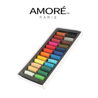 A set of vibrant pastel sticks from the Temporary Hair Chalk Set (24-Pack) by Amoré Paris is neatly arranged in a black tray with a white border against a plain white background. Above the tray, the text "AMORÉ PARIS" is written in bold, elegant letters.