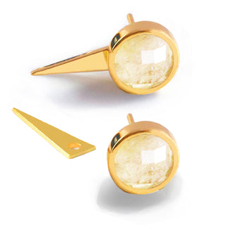 The Fire White Quartz 3-Way Earrings by Sonia Hou Jewelry exude fierce confidence with their gold stud design featuring round, faceted quartz crystal centers. Each earring includes a detachable, elongated, triangular gold piece with a small hole at one end for versatile styling options. These earrings and attachments are showcased on a white background.