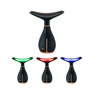 The GLO24K Skin Rejuvenation LED Beauty Device (for Face & Neck) is a black, handheld tool with a design reminiscent of a whale tail, featuring a light strip along its top edge. Displayed in four versions, it emits different colored lights—green, red, and blue. Adorned with gold accents and equipped with a front button, this device incorporates LED light therapy technology to provide age-defying benefits.